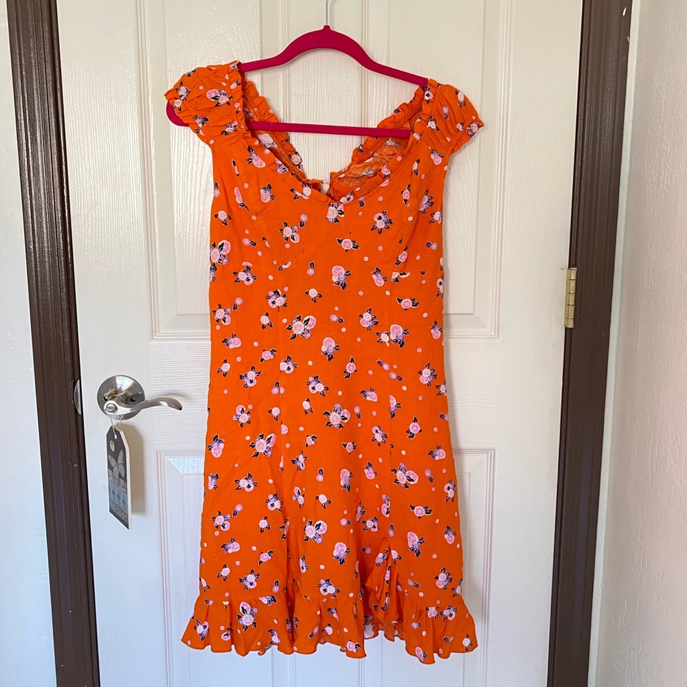 Free people never wore XS beautiful orange mini dress!